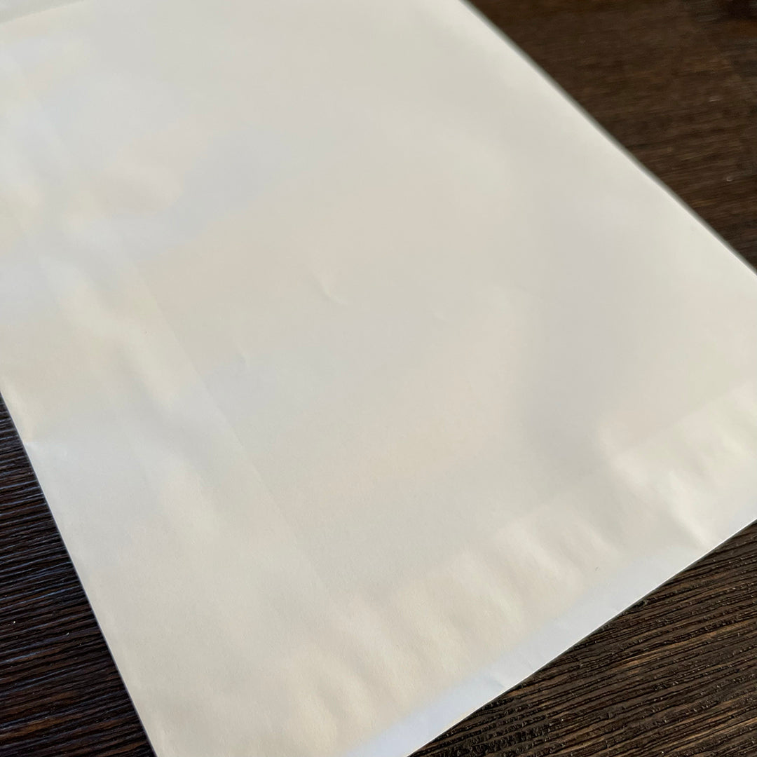 6 1/4" x 9 1/4" White Merchandise Bags